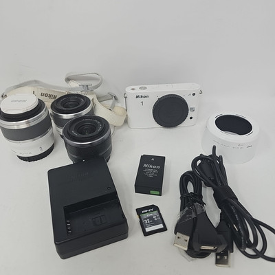 Nikon 1 J1 Camera With 10-30 & 30-110 Lenses Charger Data Cable SD Card SEE DESC