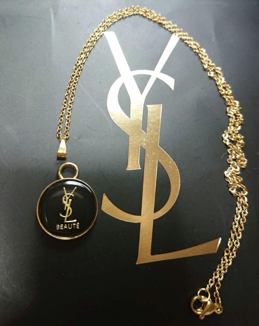 Collana Yves Saint Laurent logo YSL BEAUTE rotonda oro misura catena 50 cm con scatola