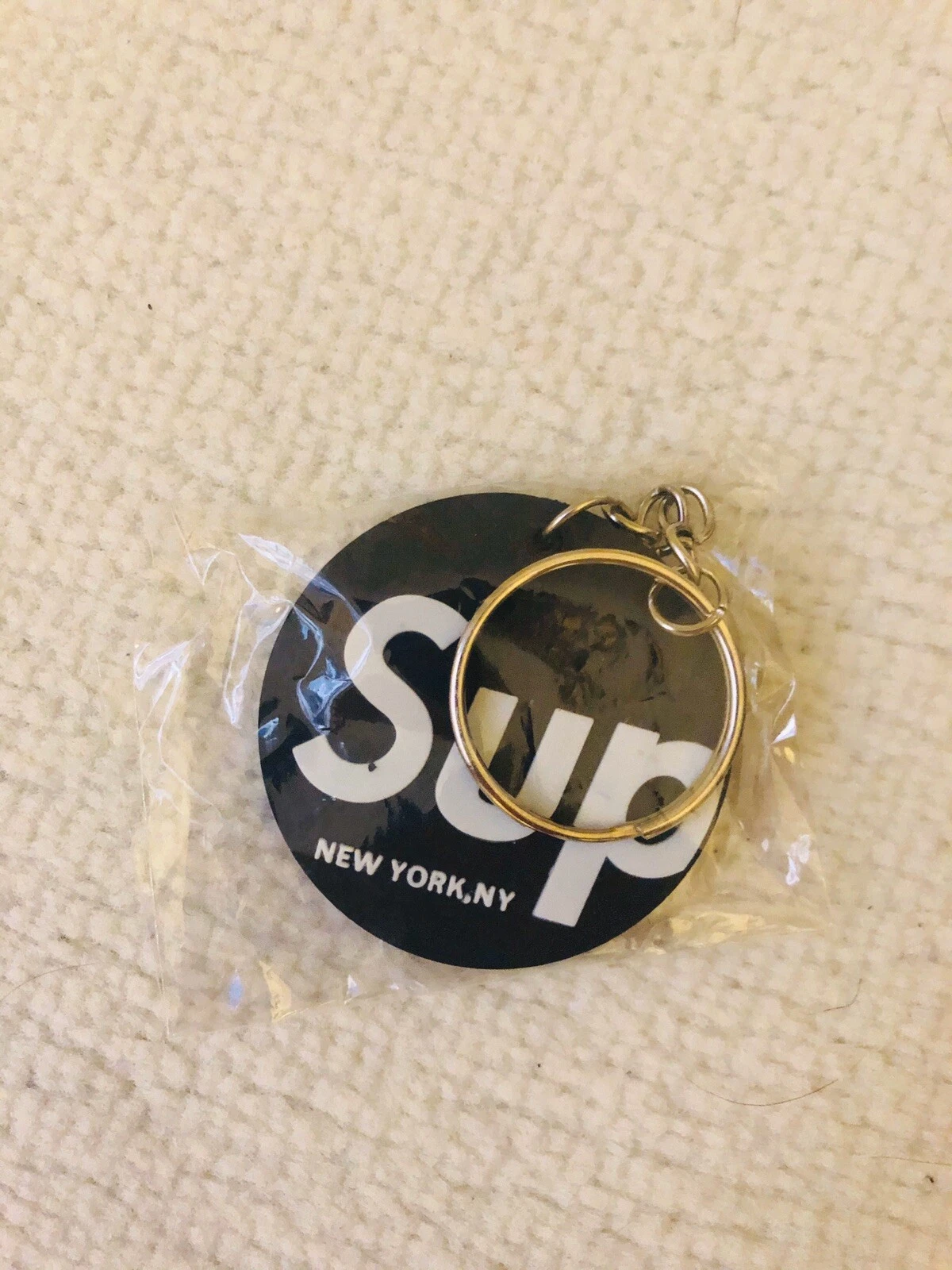 Porte clés homme logo rond Supreme New York logo rond noir porte clés