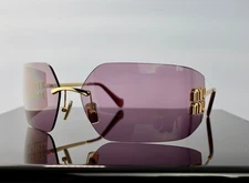 Miu Miu Runway SMU54YS 5AK06I Gold with Purple Brown Lens Rimless Sunglasses
