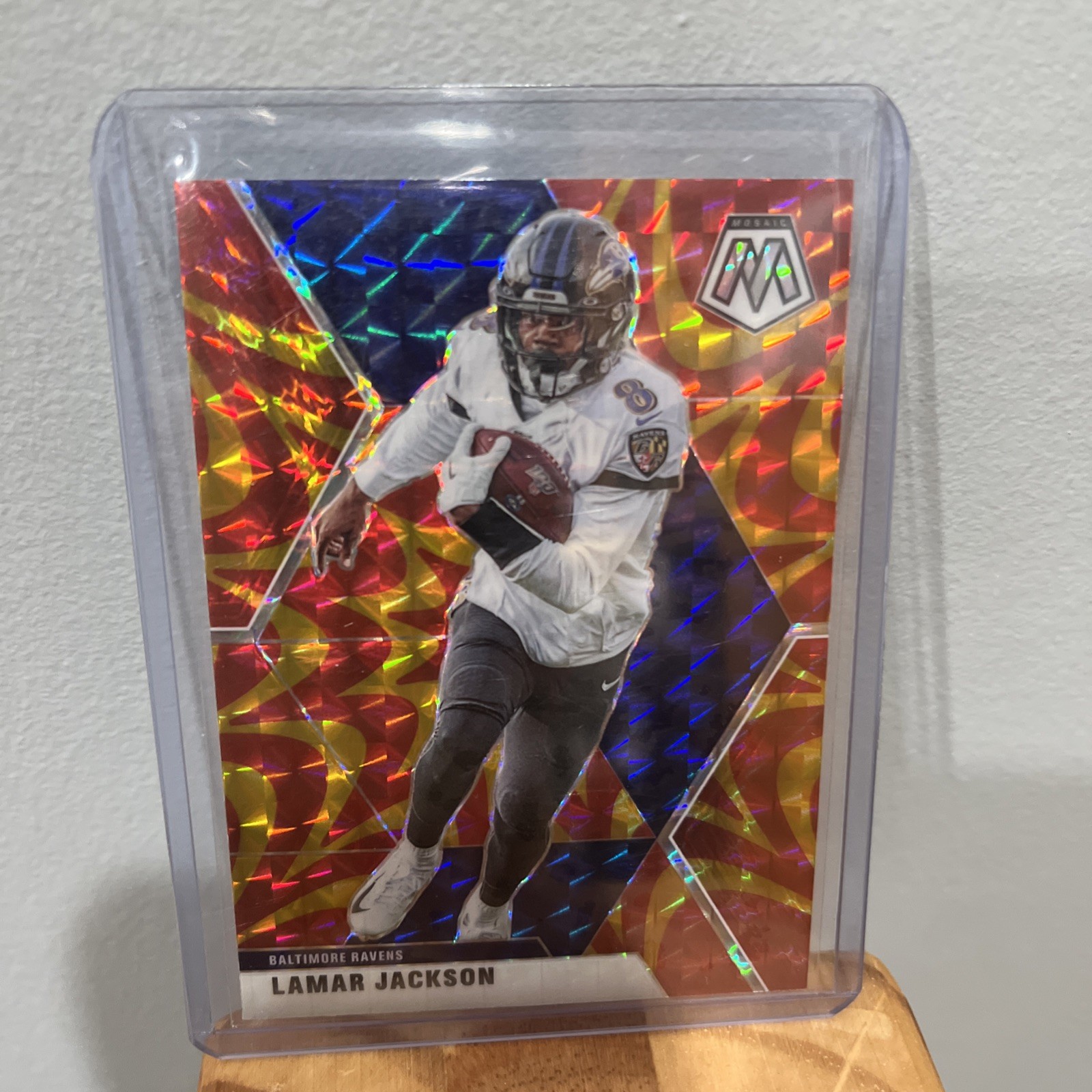 Lamar Jackson 2020 Panini Mosaic Reactive Gold Prizm Parallel Ravens #19