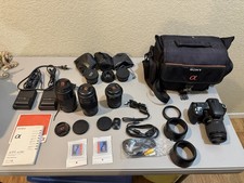 Sony Alpha 300 DSLR Camera Bundle 4 Lenses, Camera Bag, Charger And More