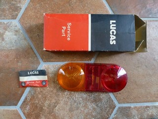 Vetro fanale posteriore Volvo P1800 originale Lucas 54573966 L671 NOS confezione originale e viti nuovo
