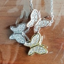 Necklace with cubic zirconia and 3-butterfly pendant