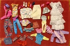 vintage lot of Barbie doll clothes and accessories.