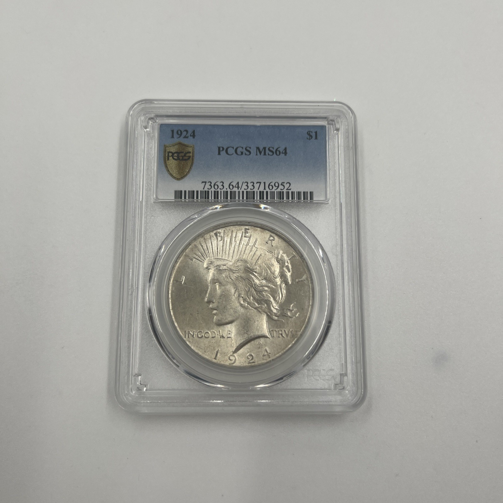 1924  $1 Peace Silver Dollar PCGS Certified MS64 Uncirculated Coin GOLD SHIELD