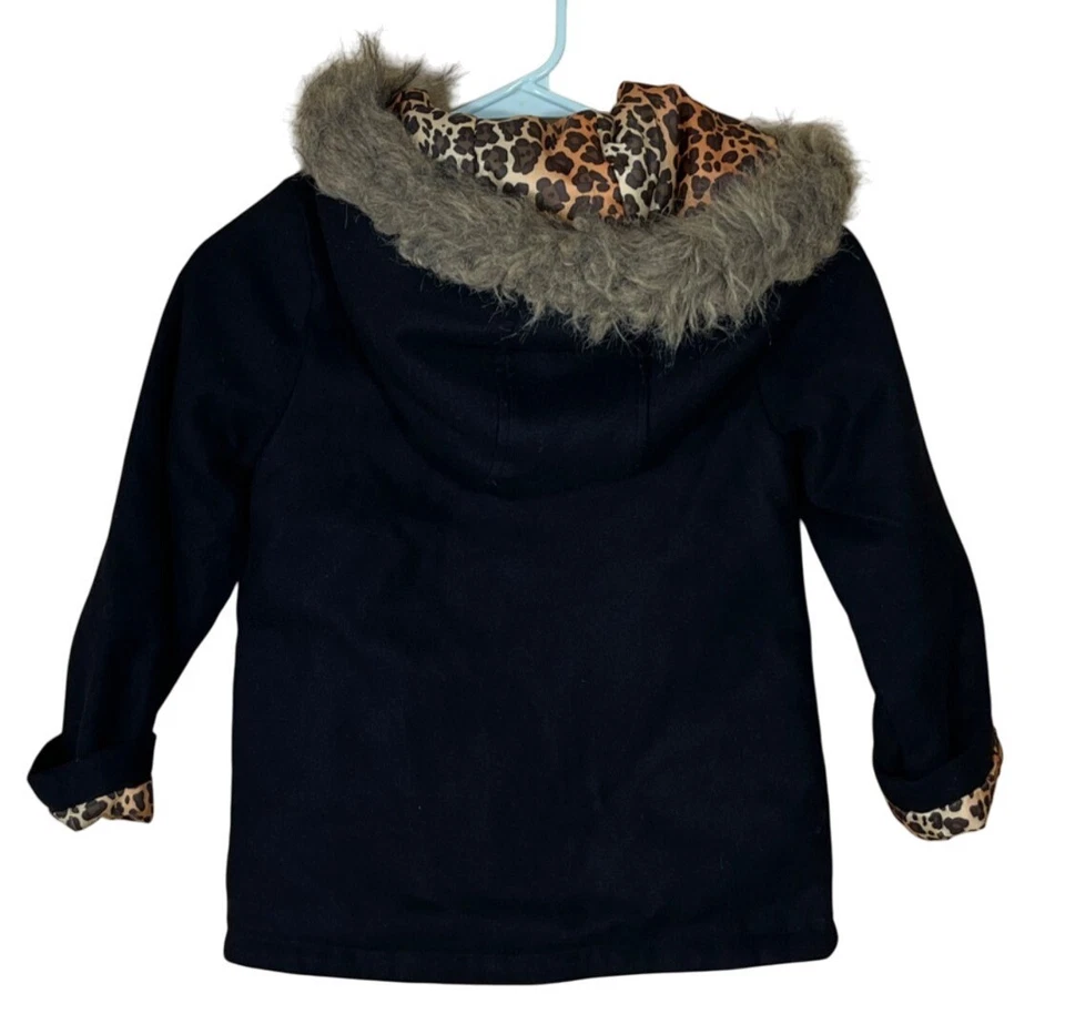 Abrigo para niña Jessica Simpson talla 7 ribete de piel sintética capucha estampado animal forrado negro Foto 2 de 4