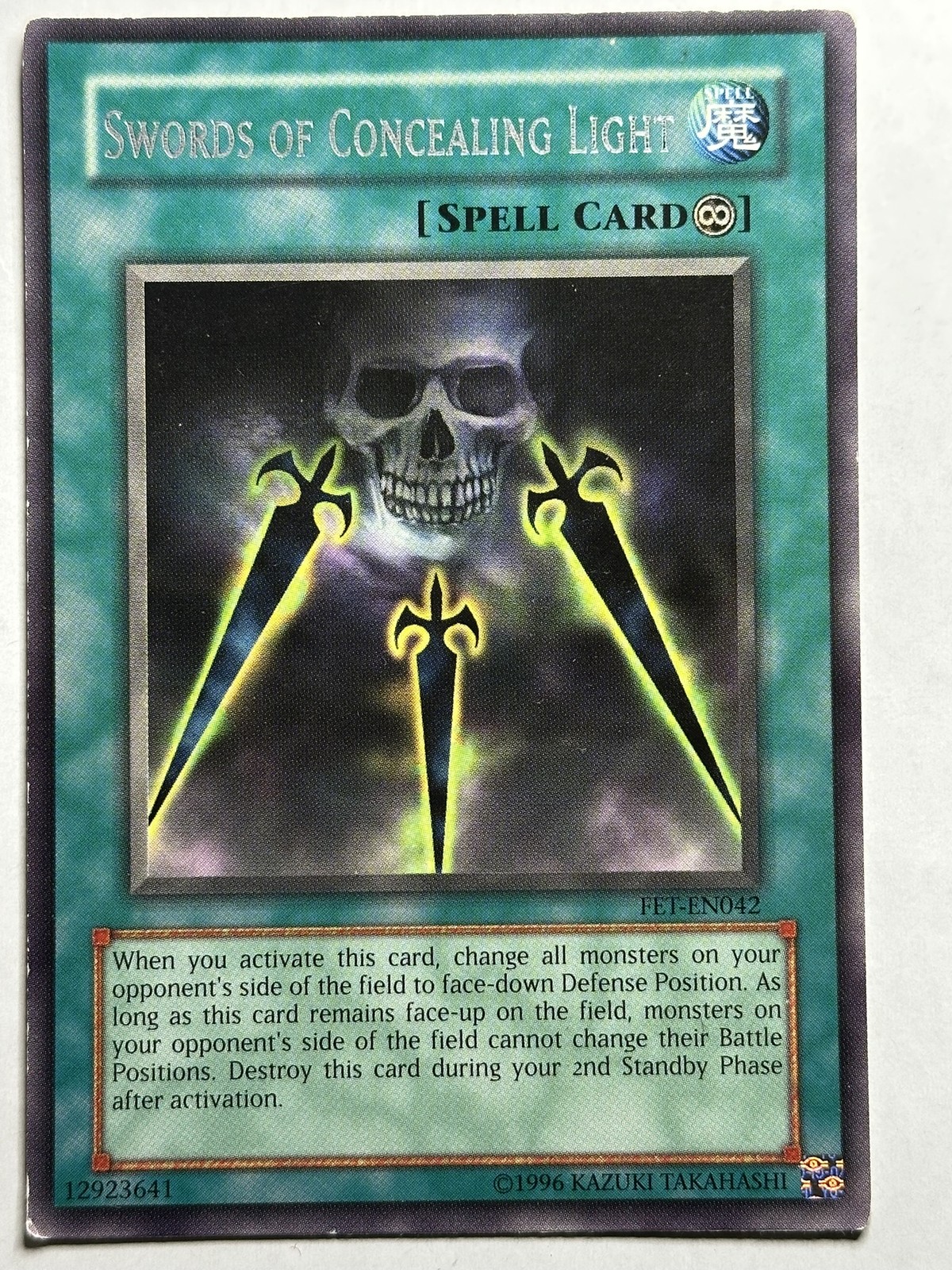 Swords of Concealing Light FET-EN042 YuGiOh Flaming Eternity trading card — raw and PSA graded price guide