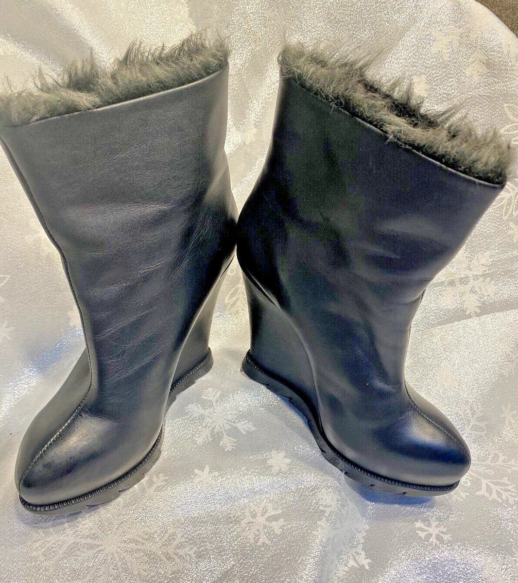 Calf length wedge boots top