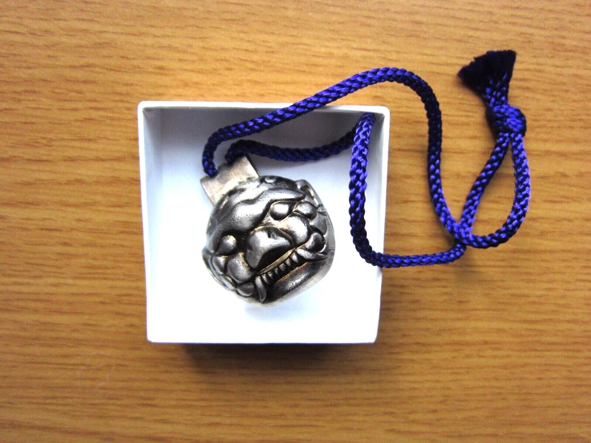 Charm to ward off evil sale