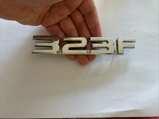Mazda 323f Badge Logo Emblem Nameplate 323 F Silver Chrome Plastic Bj3d51720 Mazda 323f Badge Logo Emblem Nameplate 323 F Silver Chrome Plastic Bj3d51720