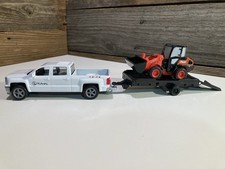 Camión y retroexcavadora Kubota con remolque Ram 3500 juguete nuevo usado en excelente estado