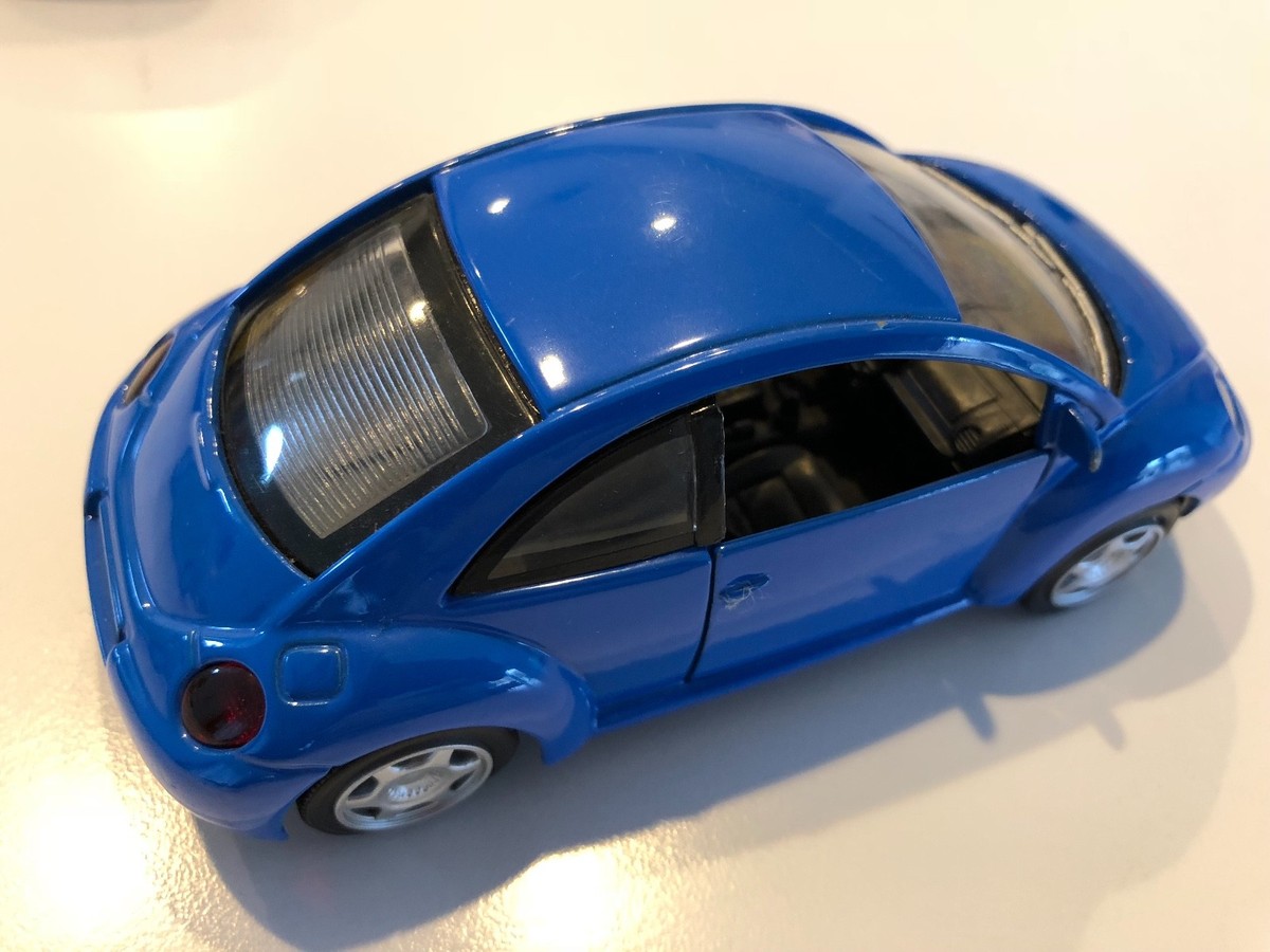 Collection of 5 '99 VW New Beetle pull-back models by SmartToys 1