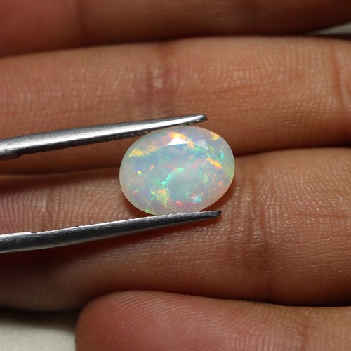 3 Carat Natural Green Red Blue Multi Fire Ethiopian Opal Oval Cut 12.8x9.9 MM - Picture 7 of 7