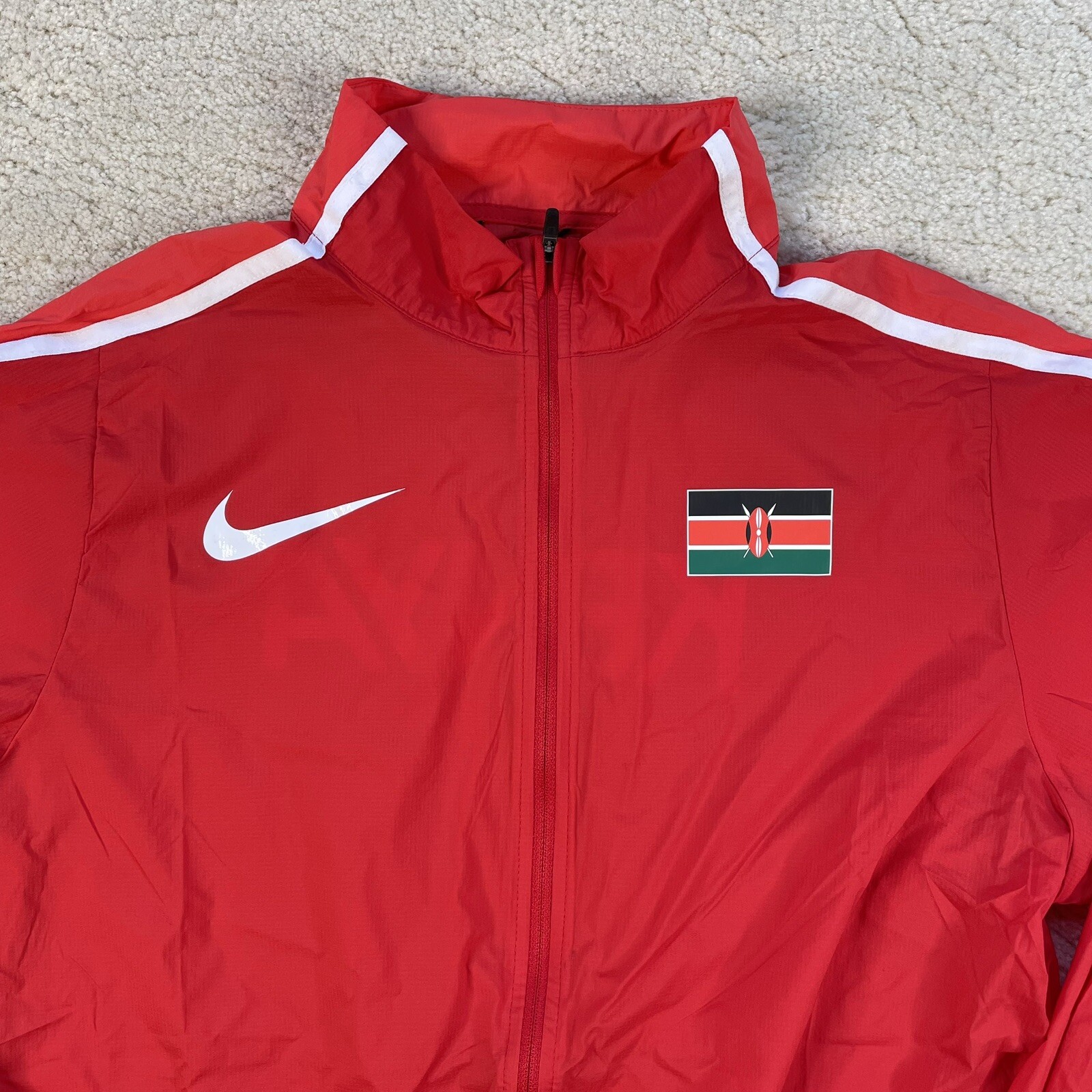 SACAI X NIKE [S] NIKE PRO ELITE OLYMPIC TEAM KENYA Giacca a vento leggera da corsa