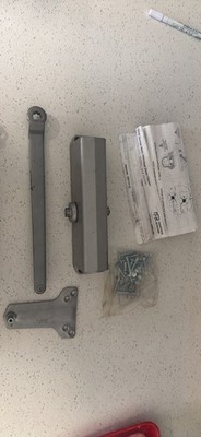 Norton 1600 Series Non-Handed Self Closing Silver Metal Door Closer w/ Hardware