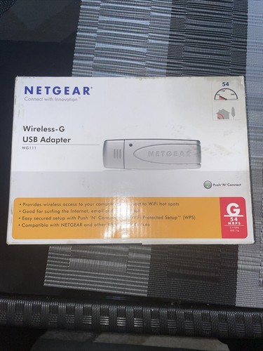 Netgear Wireless-G USB 2.0 Adapter in packaging with CD.