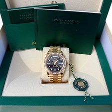 Rolex Day-Date 40 President Yellow Gold Diamond Bezel Baguette Black Dial 228348 8