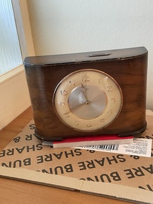 VINTAGE WALNUT CASED TIME SAVINGS CLOCK MADE IN ENGLAND