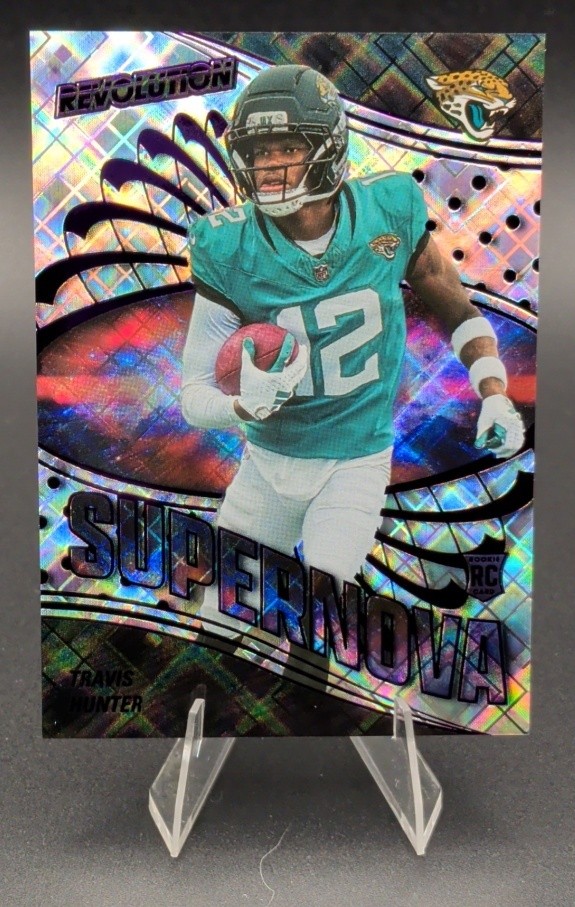 2025 Panini Revolution Travis Hunter Supernova /20 Cosmic (RC) Jaguars