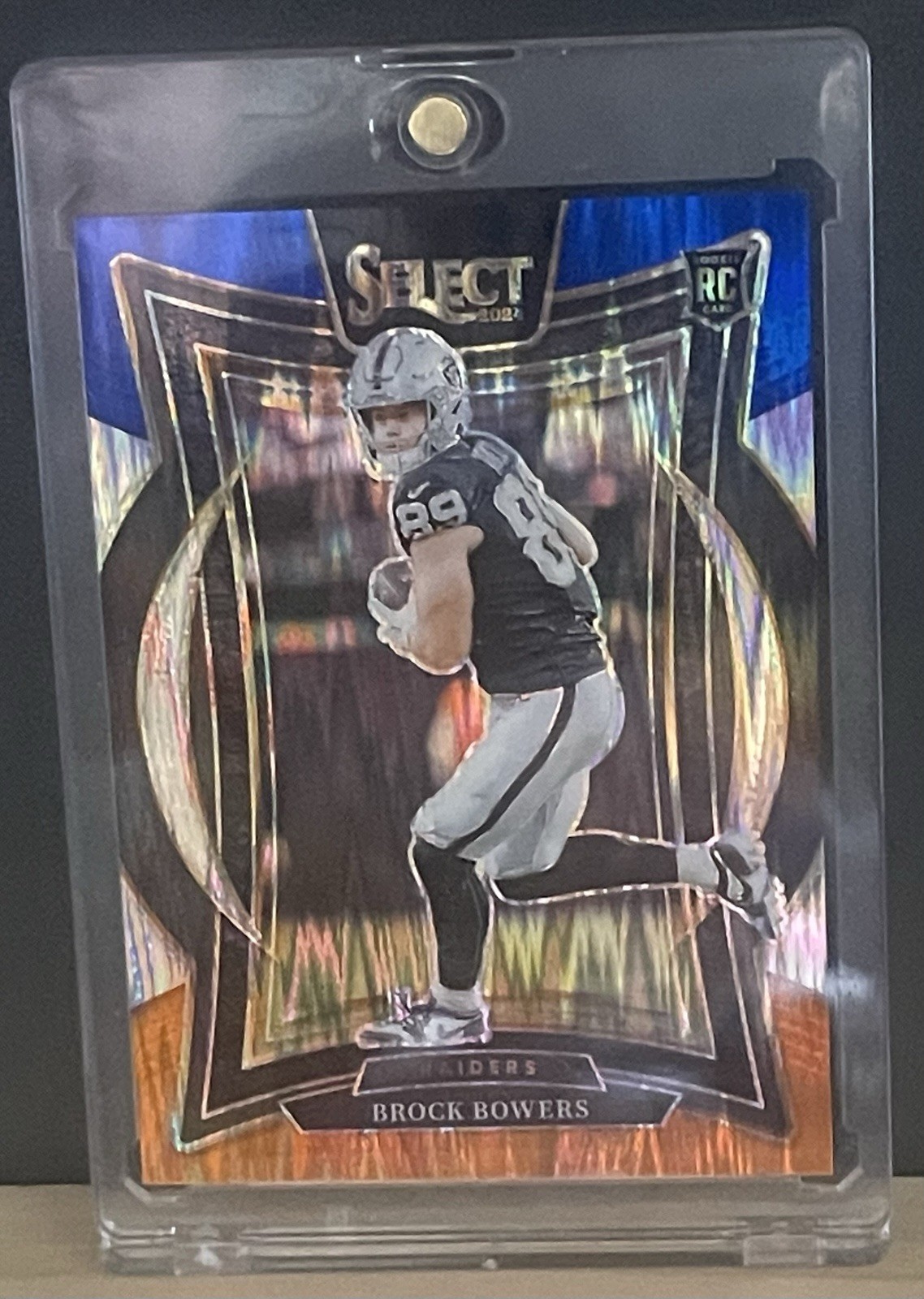 23/35 Brock Bowers RC 2024 Panini Select Concourse Blue & Orange Shock Prizm.MAG