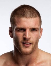 Pascal Krauss poses backstage after defeating Mark Scanlon at 122 Novem- Photo 1