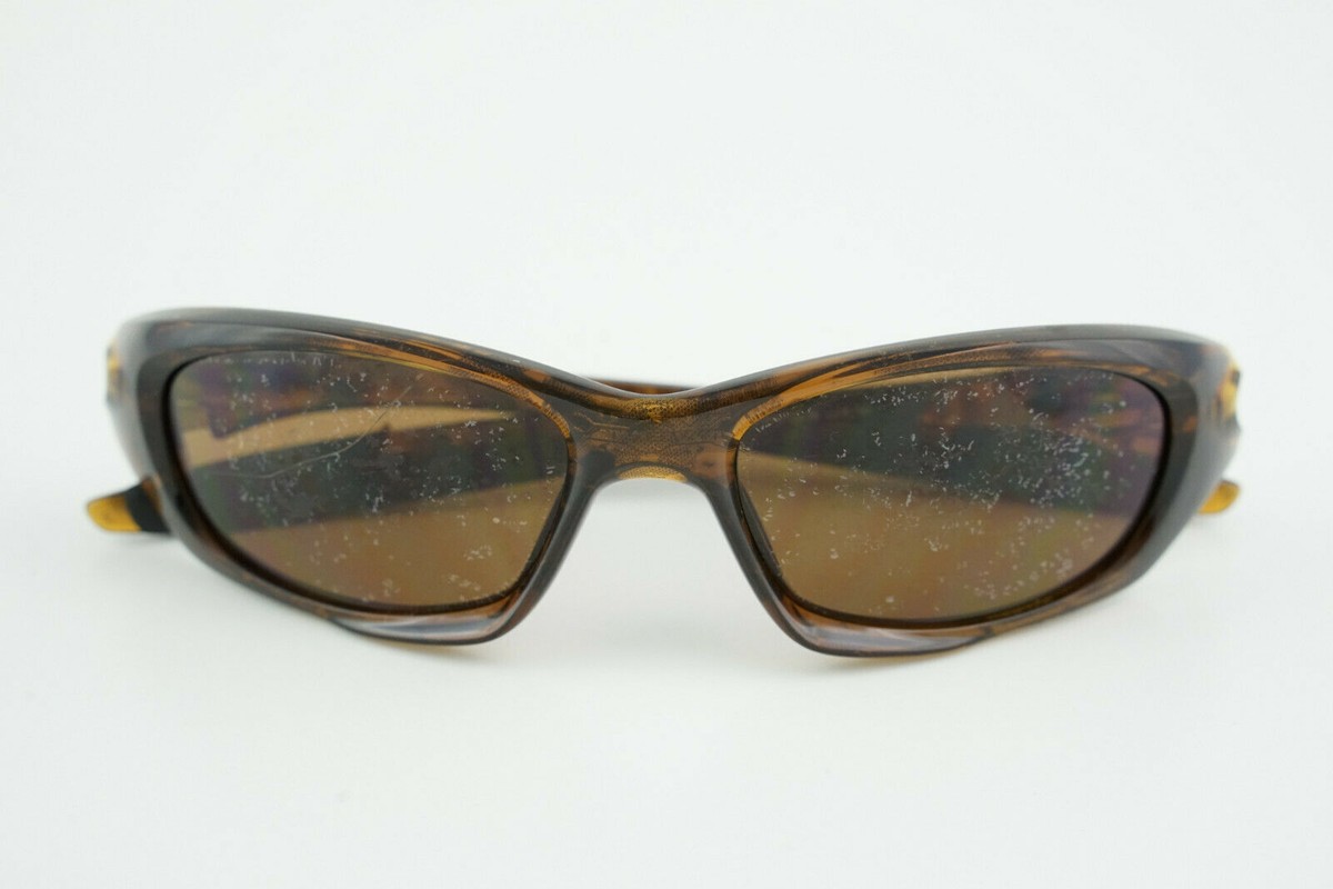 OO9157-02 Oakley XX Tortoise Brown/Bronze Sunglasses 55-18 OO9157-02 Oakley XX Tortoise Brown/Bronze Sunglasses 55-18