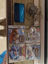 Nintendo 3DS Console Metallic Green Handheld System With 4 Games And Charger.