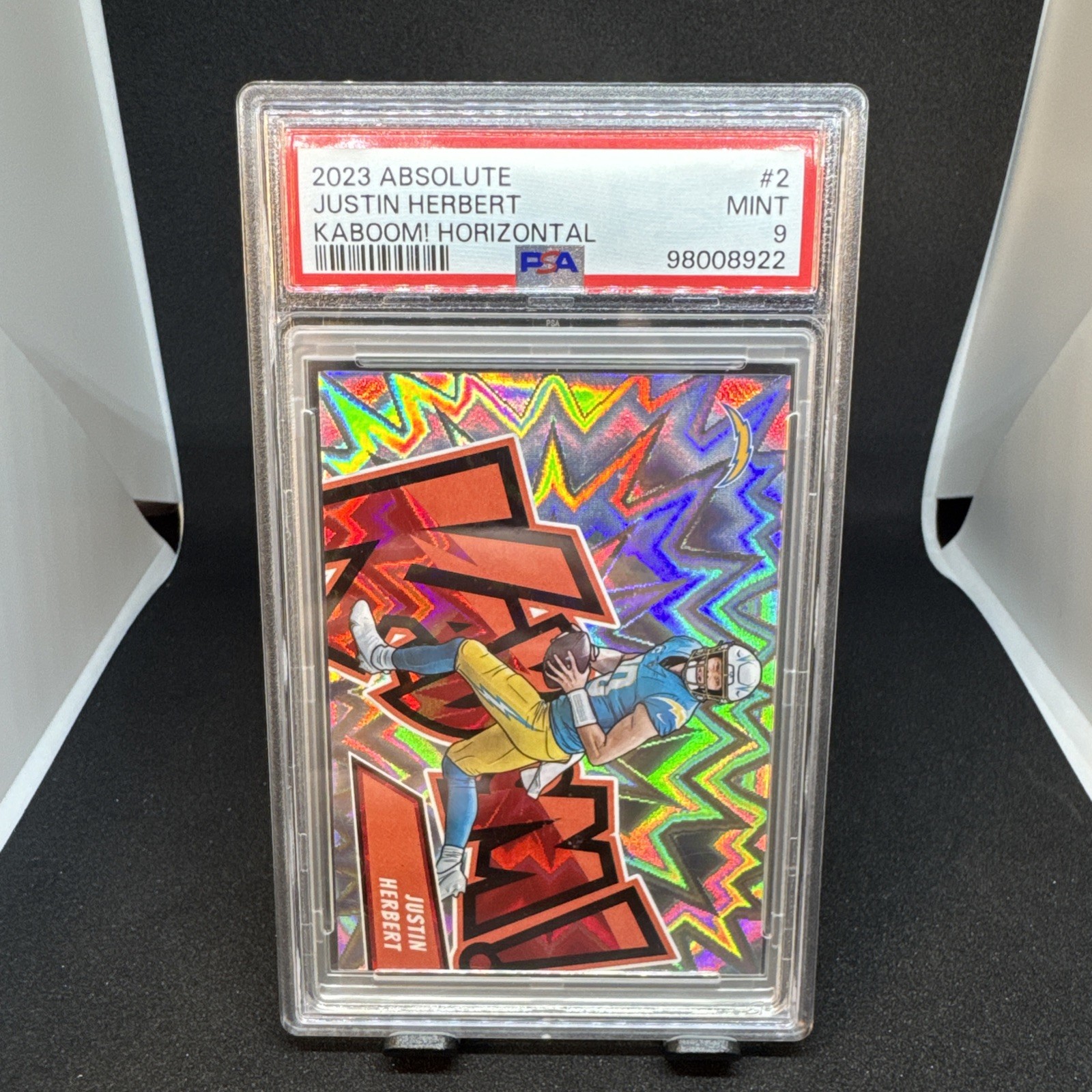 2023 Panini Absolute KABOOM! #2 Justin Herbert Chargers SSP CASE HIT PSA 9 MINT