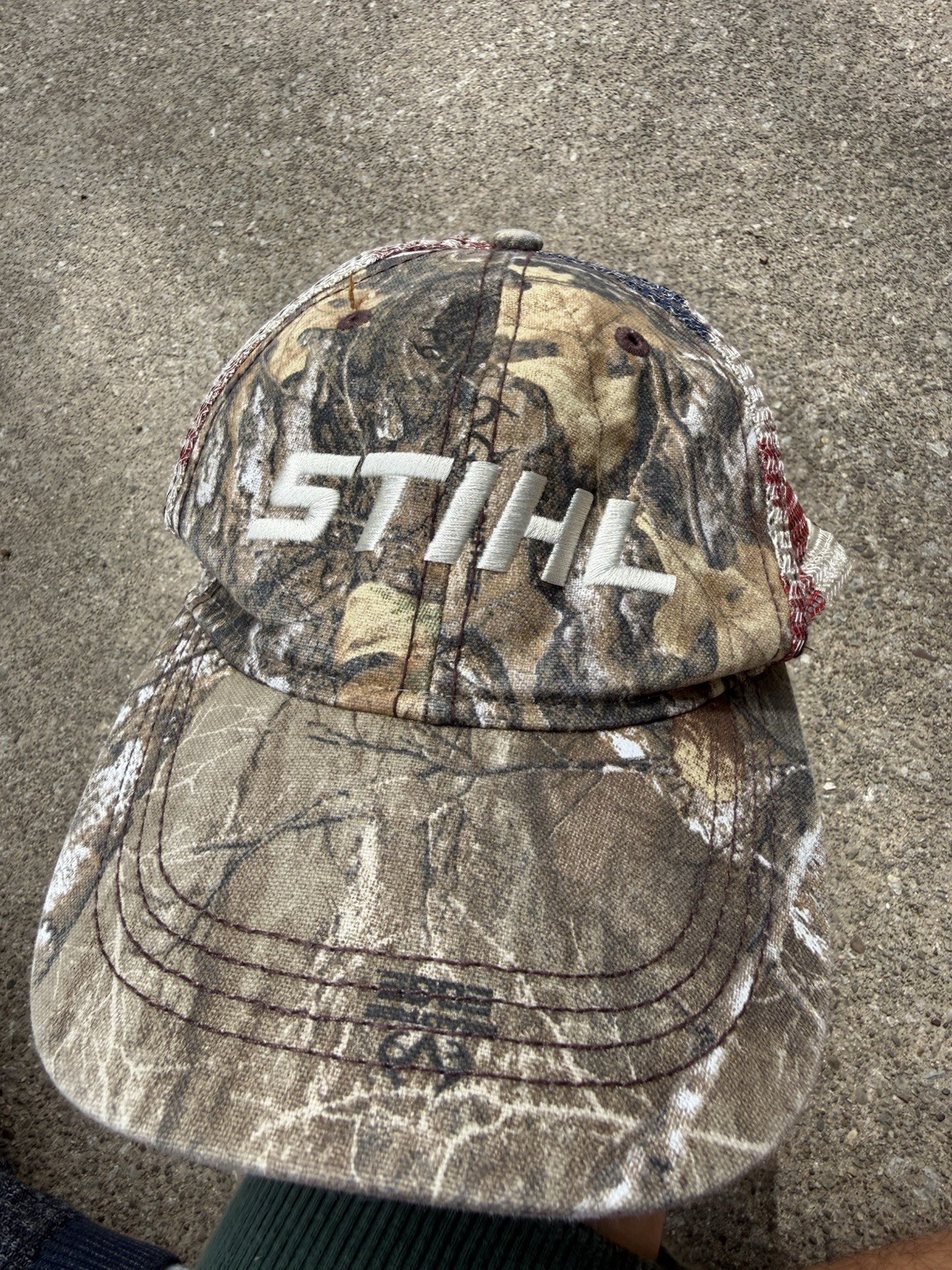 Vintage Stihl Tree Camo Trucker Hat With American Flag On The Back.