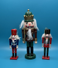 Lot of 3 Wooden Christmas Nutcrackers 2 Ornaments  1 Regular For Shelf Or Table