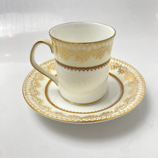 Elizabethan Swiss Cottage Coffee Can & Saucer Gold Lace English Bone China