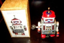 Robot wind up w/key antenna all tin nice action works well Mint in original box