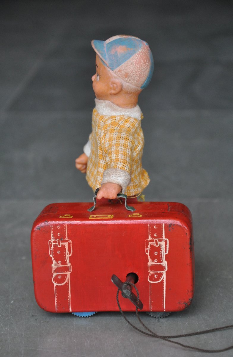 Vintage Wind Up Man Carrying Suitcase Litho Tin & rubber Toy