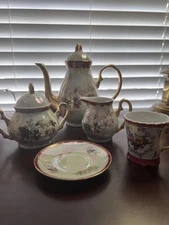 Vintage Pearl China Lusterware Teapot, Sugar, Creamer, Cup and Saucer.