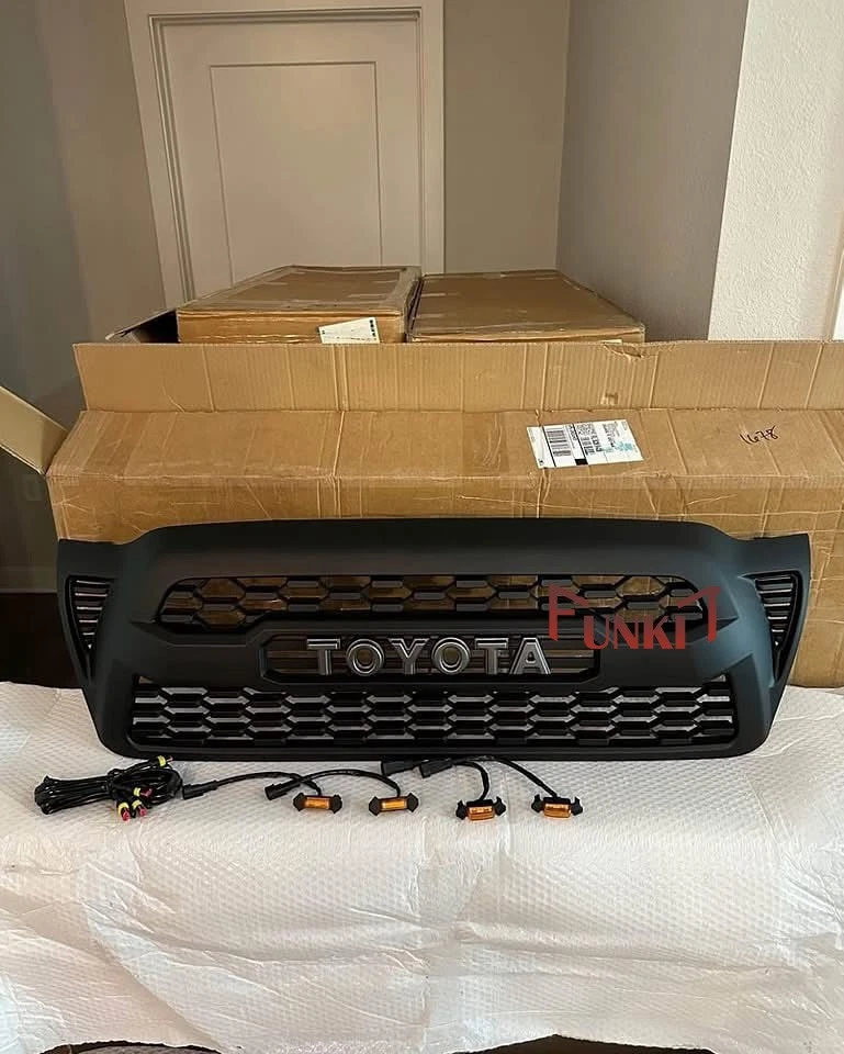 Parrilla delantera para parachoques Tacoma 2005-2011 rejilla de malla negra mate con 4 luces LED Foto 2 de 4