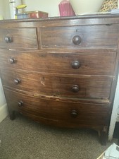 An antique mahogany bow front Chest of Draws 3 Large Draws 2 Smaller draws