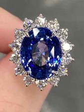 Impressive Clear Blue Oval Cut Sapphire White Cubic Zirconia Halo Style Ring
