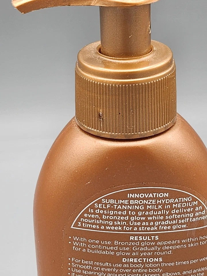 Leche autobronceadora hidratante Loreal Sublime bronce brillo gradual MEDIANA 5,5 oz Foto 3 de 3