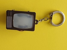 Porte clé vintage télé visionneuse : 7 photos de Pin Up nues en couleur