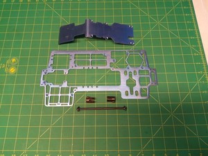 Tmaxx titanium Hardcore Racing big block web chassis with skid rear driveshaft