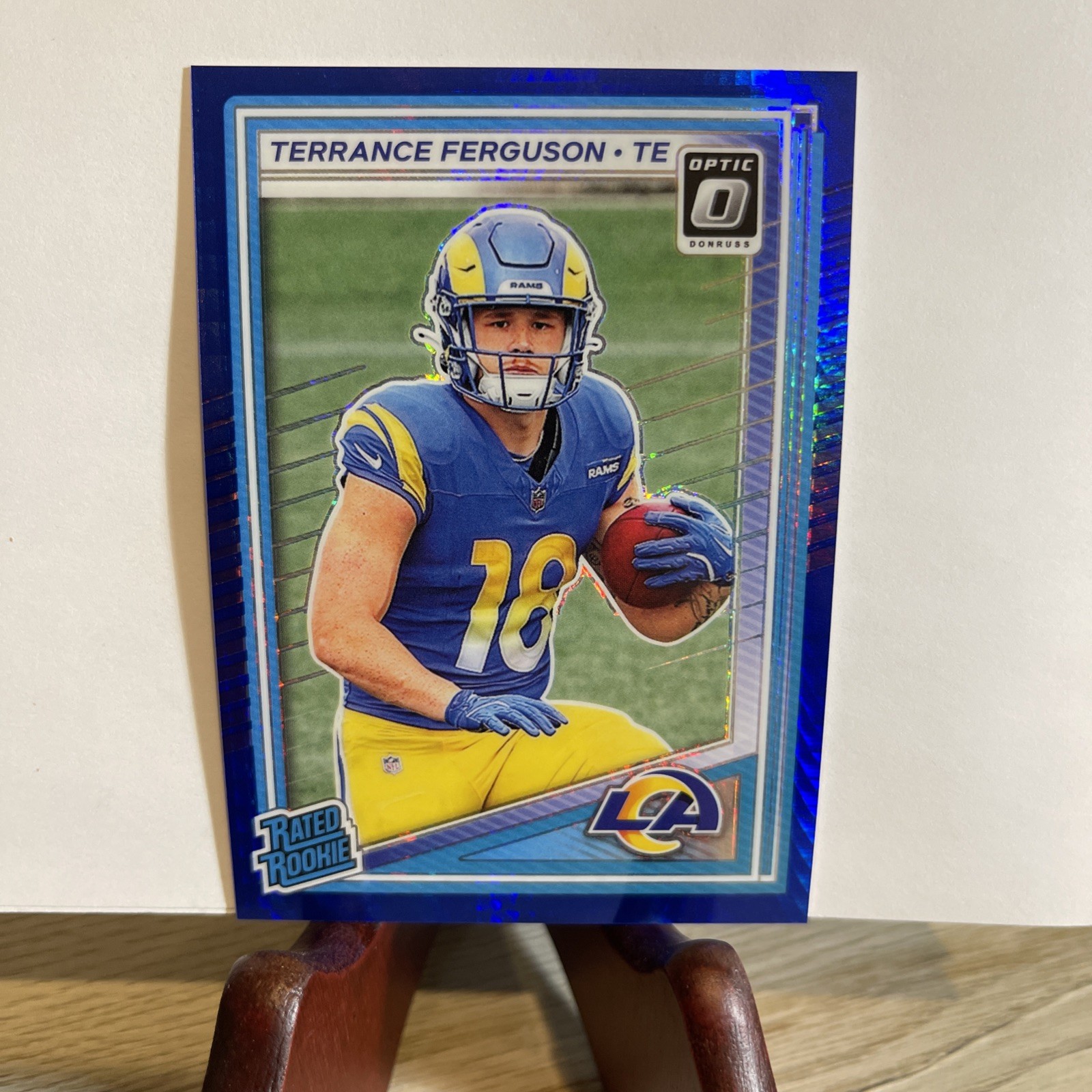 2025 Panini Optic Rated Rookie Blue Glitter Terrance Ferguson Rams #244