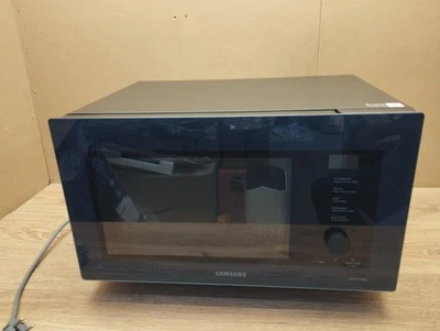 Samsung MC32DB7746KDE1 Mikrowelle mit Grill/Heißluft, 32L,schwarz, I39564 - Bild 1 von 4