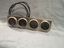 Auto Meter Water 3431 Oil 3421 Volts And Amps Gauges Mounted In Holder Auto Meter Water 3431 Oil 3421 Volts And Amps Gauges Mounted In Holder