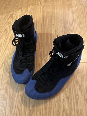 blue and black nike inflicts