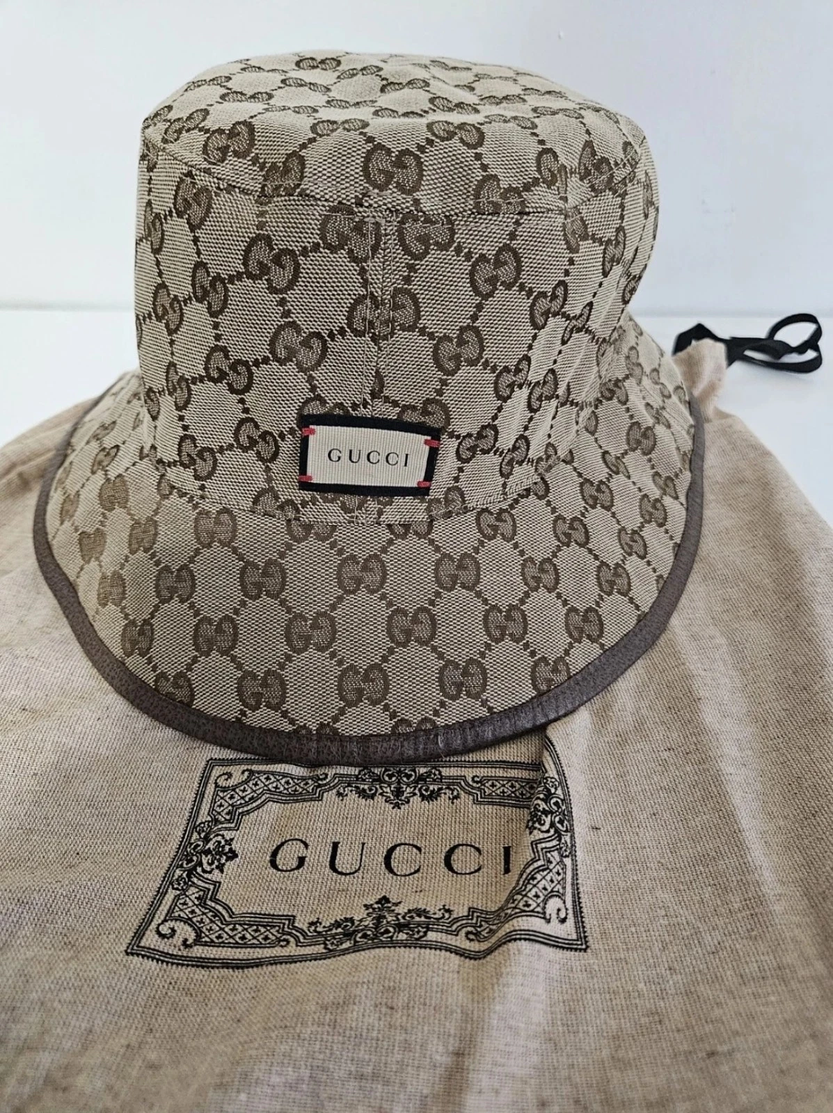 Gucci Brown GG Logo reversible bucket hat Size 58cm