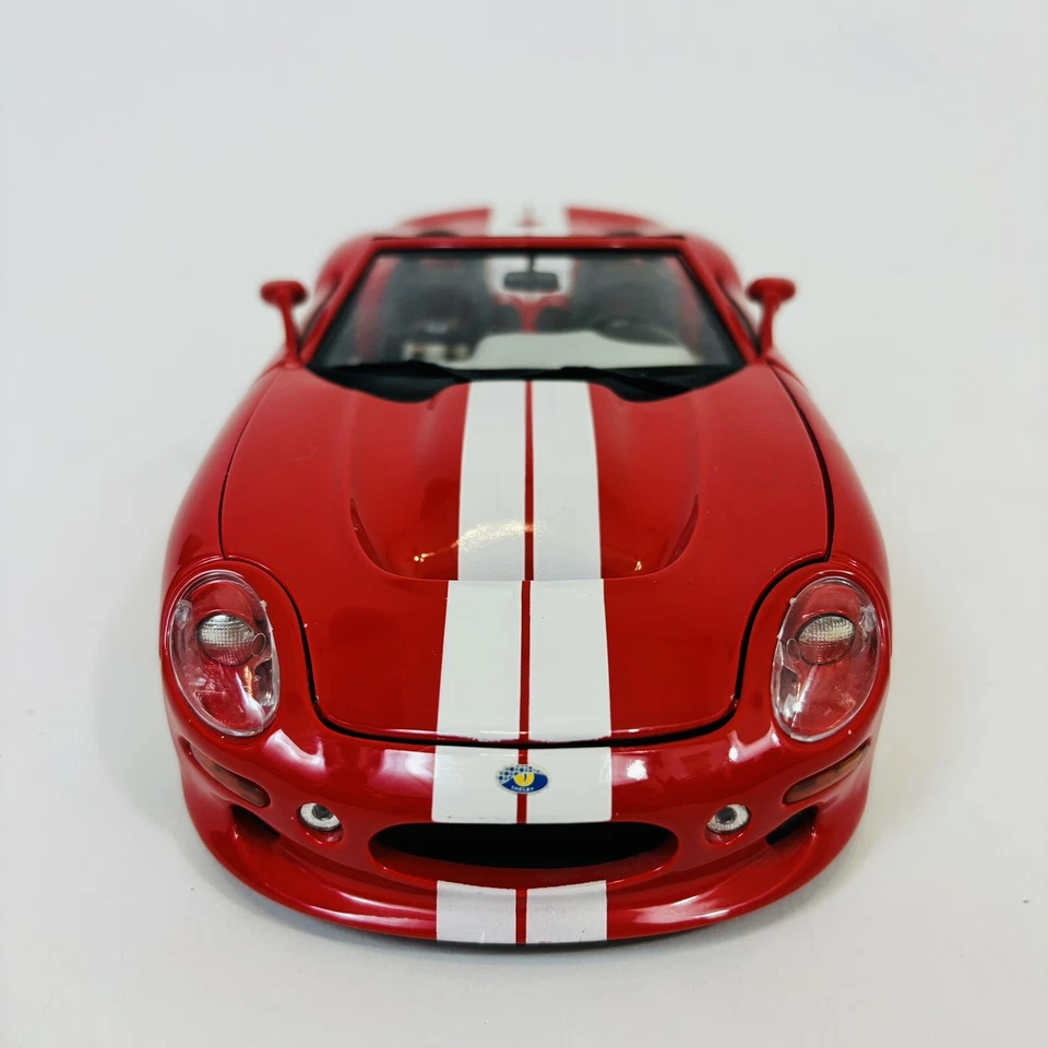 Figura de juguete deportivo Burago Shelby serie 1 roja con rayas coche fundido a presión 1/18  Foto 2 de 4