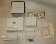 Grouping LOT Package of iSmart Alarm Parts Sensors, Remotes, Cube One iPU3 