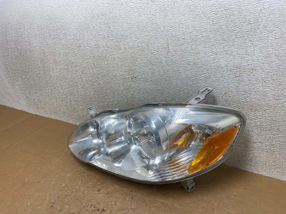 Faro lateral izquierdo Toyota Corolla 2005-2008 OEM V5130 DW Foto 2 de 4