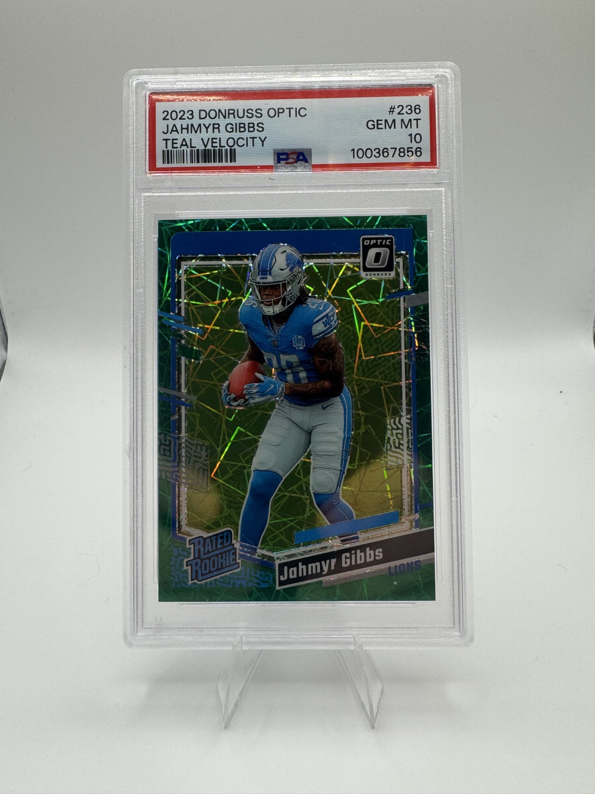 2023 Optic - Rated Rookie Jahmyr Gibbs #236 Teal Velocity Prizm PSA 10 Lions